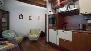 A kitchen or kitchenette at Italianway - San Calocero 29