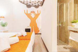 Postel nebo postele na pokoji v ubytování Oh Nice Revellin Ceuta