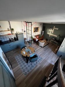 an aerial view of a living room with a table at Entre Nous Le Maréchal in Saumur
