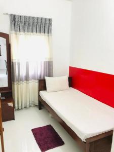 Postel nebo postele na pokoji v ubytování Bon Voyaage Tourist Inn