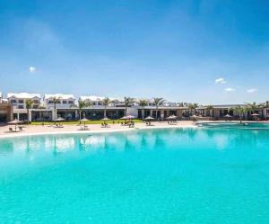 a large pool with blue water in a resort at The Blyde Apartment 1287 in Pretoria