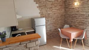 Kuchyň nebo kuchyňský kout v ubytování Premium Appartments Suha Punta