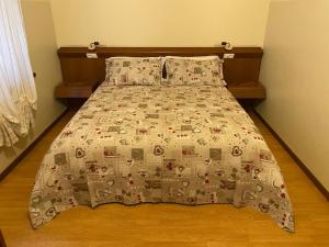 Voodi või voodid majutusasutuse Hotel Le Clou toas