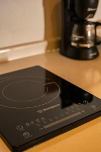 a remote control sitting on top of a counter at Villa Mosaico - Luxury Lofts in Real de Catorce