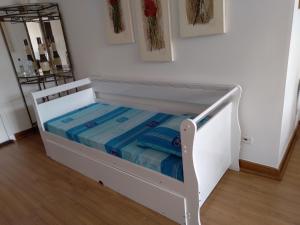 Ένα ή περισσότερα κρεβάτια σε δωμάτιο στο Apartamento da Maria Eunice