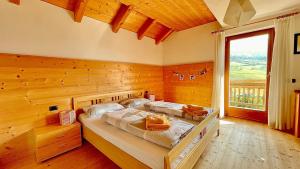 A bed or beds in a room at Apartment HaNiLe