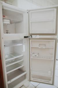 Kuchyň nebo kuchyňský kout v ubytování Condominio Garça Branca