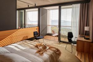 Postel nebo postele na pokoji v ubytování Hotel Osmolis + 37 fotografií