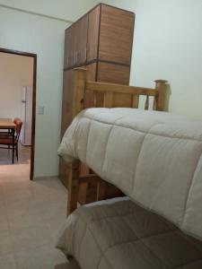 En eller flere senger på et rom på Casa Huerta