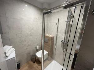 Kúpeľňa v ubytovaní Apartament BD Premium III Klifowa + 37 fotografií