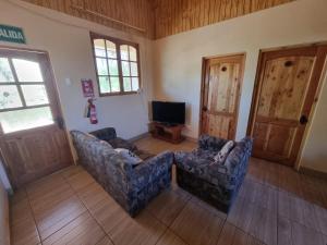 TV a/nebo společenská místnost v ubytování Hospedaje Atitur