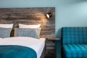 Postel nebo postele na pokoji v ubytování Quality Hotel The Reef