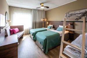 Postel nebo postele na pokoji v ubytování Quality Hotel The Reef