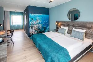 Postel nebo postele na pokoji v ubytování Quality Hotel The Reef
