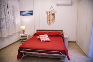 Postel nebo postele na pokoji v ubytování La Marea Monolocale sul mare