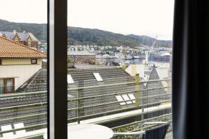 a view through a window of a building at Scandic Bergen City in Bergen