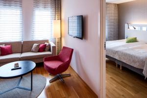 Säng eller sängar i ett rum på Scandic Plaza Borås