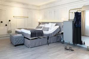A bed or beds in a room at Scandic Rubinen