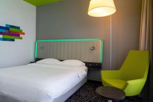 Кровать или кровати в номере Park Inn by Radisson, Nairobi Westlands