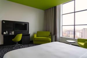 Кровать или кровати в номере Park Inn by Radisson, Nairobi Westlands