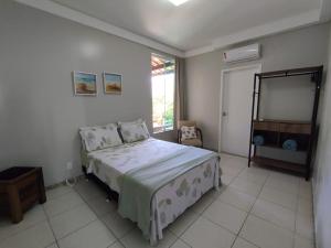 Giường trong phòng chung tại Linda casa de praia em Aracaju! +24 ảnh