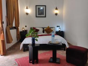Voodi või voodid majutusasutuse Riad Dar Foundouk and Spa toas