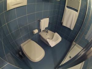 Koupelna v ubytování City Hotel