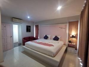 Postel nebo postele na pokoji v ubytování Phuket Racha Kata Homestay