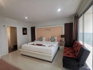 Postel nebo postele na pokoji v ubytování Phuket Racha Kata Homestay