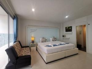 Postel nebo postele na pokoji v ubytování Phuket Racha Kata Homestay
