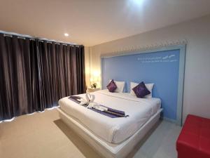 Postel nebo postele na pokoji v ubytování Phuket Racha Kata Homestay