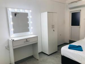 Postel nebo postele na pokoji v ubytování Double Mango Villa