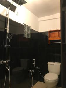 Phòng tắm tại Double Mango Villa