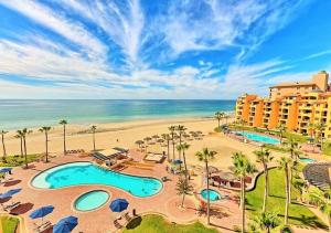 an aerial view of a resort and the beach at Right on the Beach! Ocean Front 2 Story Penthouse in Puerto Peñasco