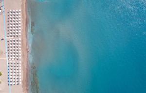 an overhead view of a beach and the ocean at Apollo Blue in Faliraki