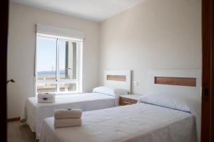 Fotografia z galérie ubytovania Apartment on the first line of Samil beach and with frontal views of the sea v destinácii Vigo