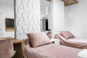Кровать или кровати в номере Vila Cander