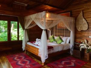 Cama ou camas em um quarto em Viking Nature Resort