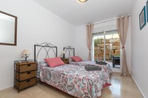 Posteľ alebo postele v izbe v ubytovaní Holiday apartment in Mijas Golf