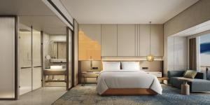 Postel nebo postele na pokoji v ubytování Crowne Plaza Hohhot City Center
