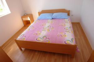 Postel nebo postele na pokoji v ubytování Apartments Dubrovnik Two