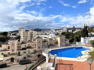 a view from the balcony of a apartment building with a swimming pool at Casa Lindblad Fuentesol 15 Casasol in Nerja