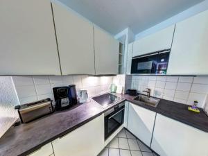 Kuchyň nebo kuchyňský kout v ubytování Feriendomizil Seepark