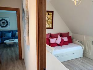 A bed or beds in a room at Perla del Cantábrico