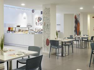 Restoran või mõni muu söögikoht majutusasutuses Art Hotel Principe