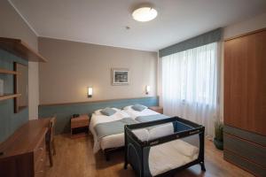 Voodi või voodid majutusasutuse Albergo San Carlo toas