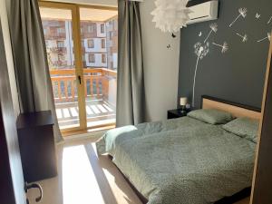 Кровать или кровати в номере Premium Apartments Bansko