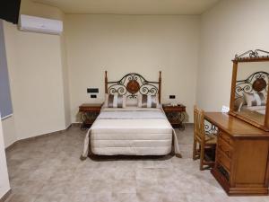 Posteľ alebo postele v izbe v ubytovaní Hotel Novo