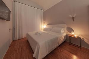 Postel nebo postele na pokoji v ubytování Lidia Chambres D'hotes