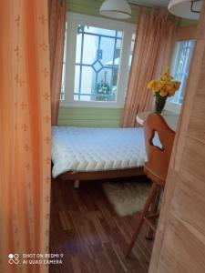 Tempat tidur dalam kamar di Jurmala`s Center Mini House